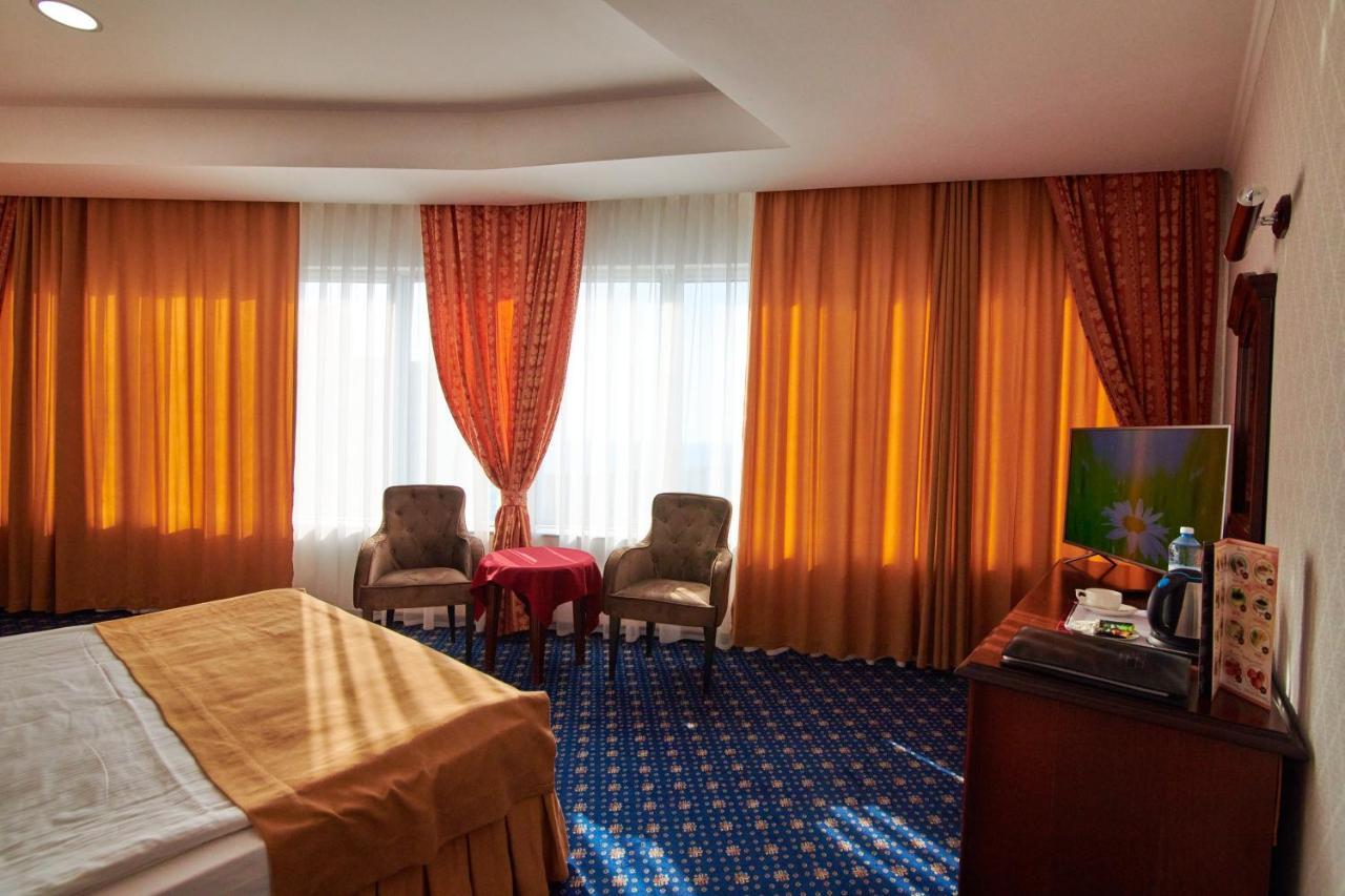 Grand Hotel Victory Aktau  Extérieur photo A room at the hotel