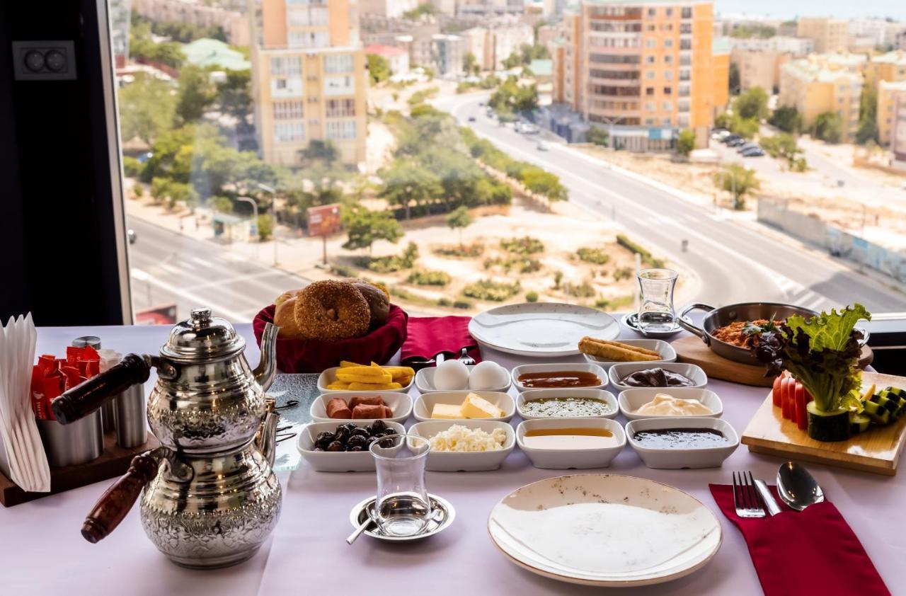 Grand Hotel Victory Aktau  Extérieur photo Israeli breakfast