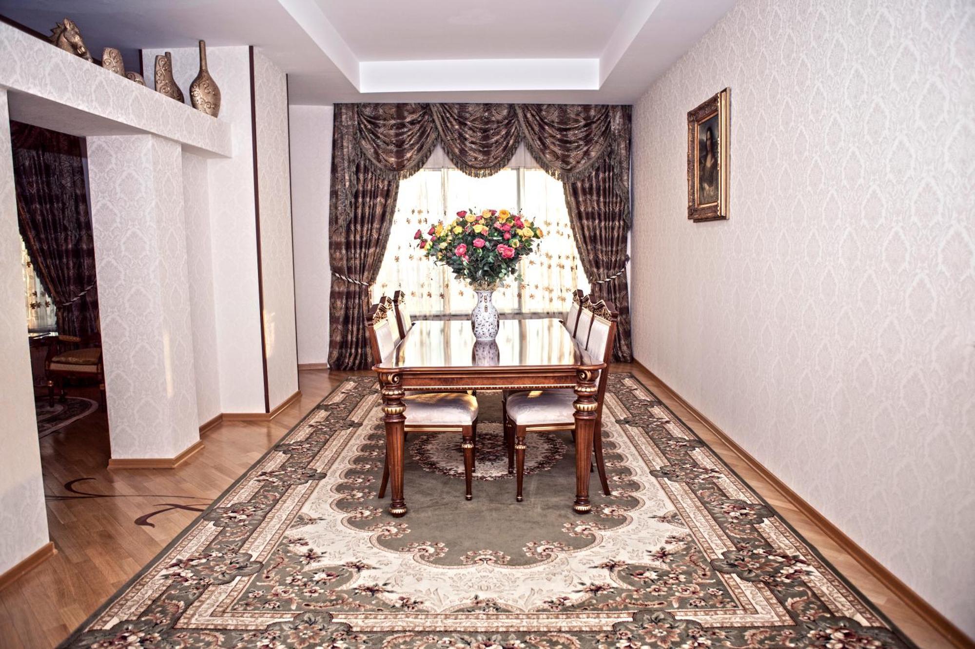 Grand Hotel Victory Aktau  Extérieur photo A dining room